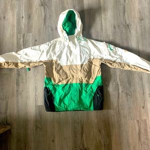 Men’s Burton jacket shell. Green, white, tan, black color blocking. Size L
